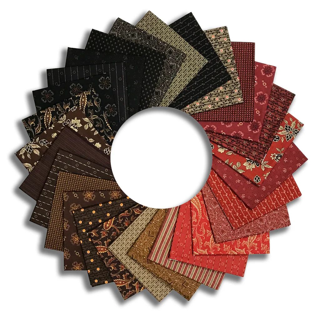 Printed fat quarter bundle with red, black, gold, and brown fabric pieces in a ring