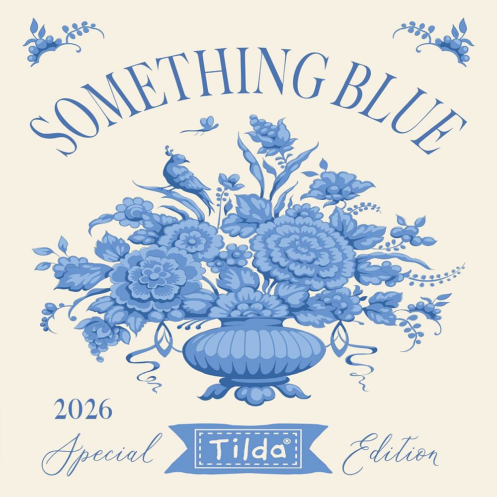 Cream quilt fabric with blue floral bouquet print and 'Something Blue' title
