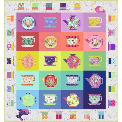 Multicolor patchwork quilt top with whimsical teapot and hat prints