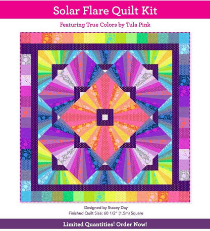 Solar Flare quilt kit design featuring radiant starburst blocks in bright multicolor