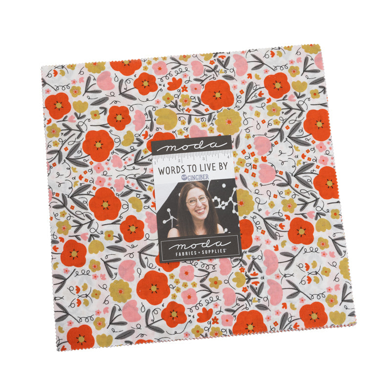 Quilt fabric layer cake, 10-inch squares with orange and yellow flowers on light background