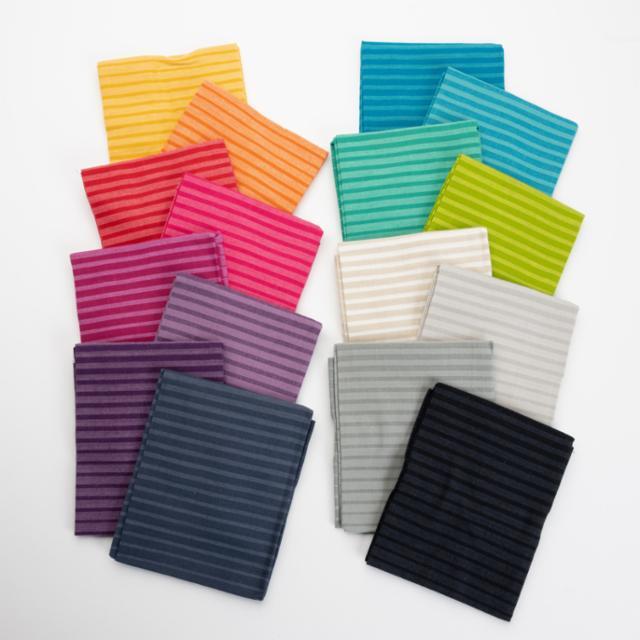 Striped fabric fat quarter set with folded squares in yellow, orange, pink, teal, green, gray, black
