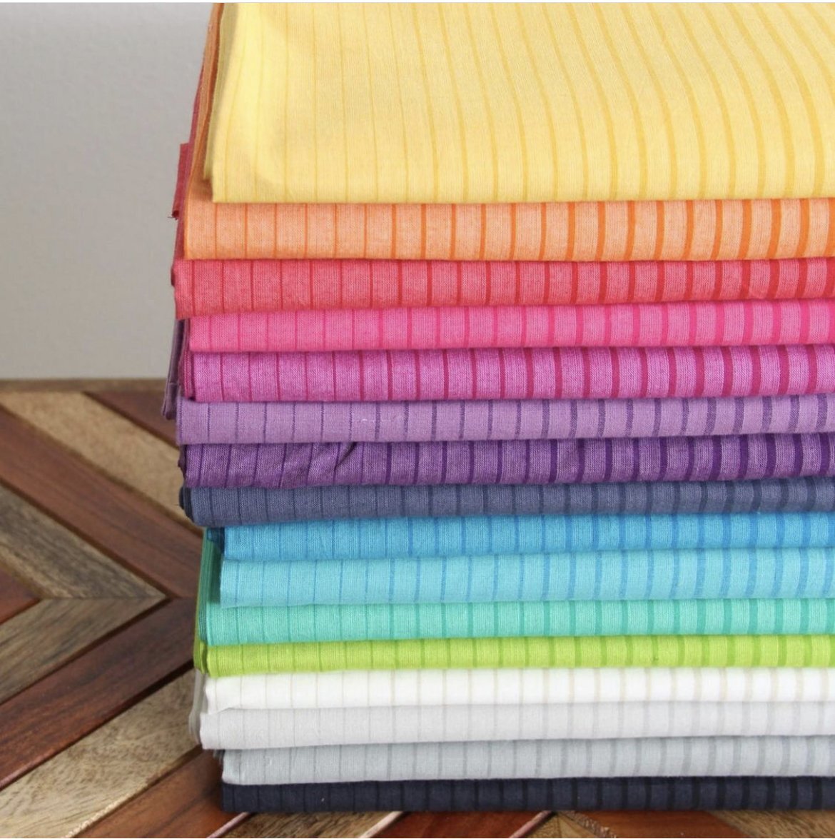 Striped ombre fabric fat quarter stack in yellow, pink, purple, blue, lime, and white