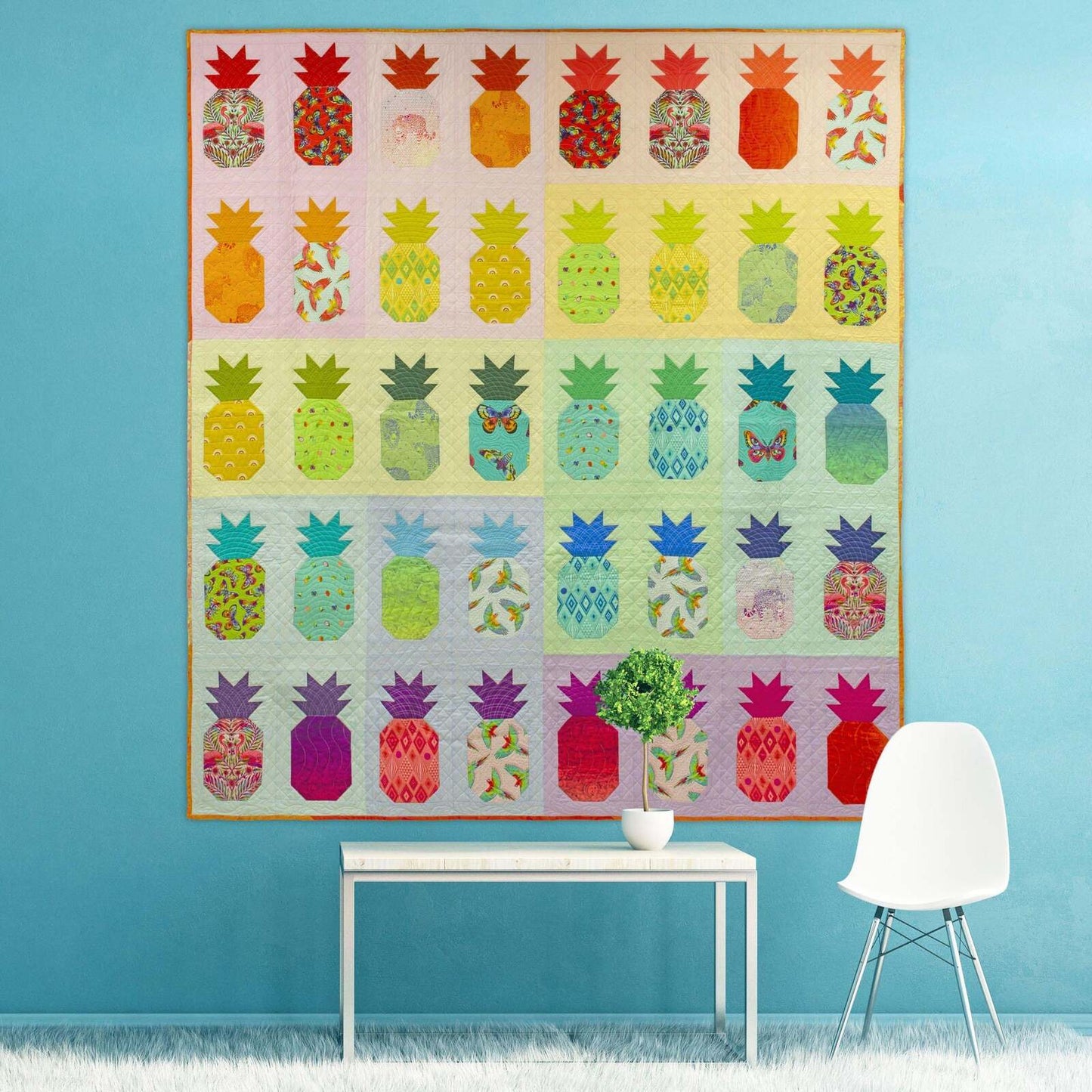 Pineapple quilt with rows of colorful pineapple blocks on cream background