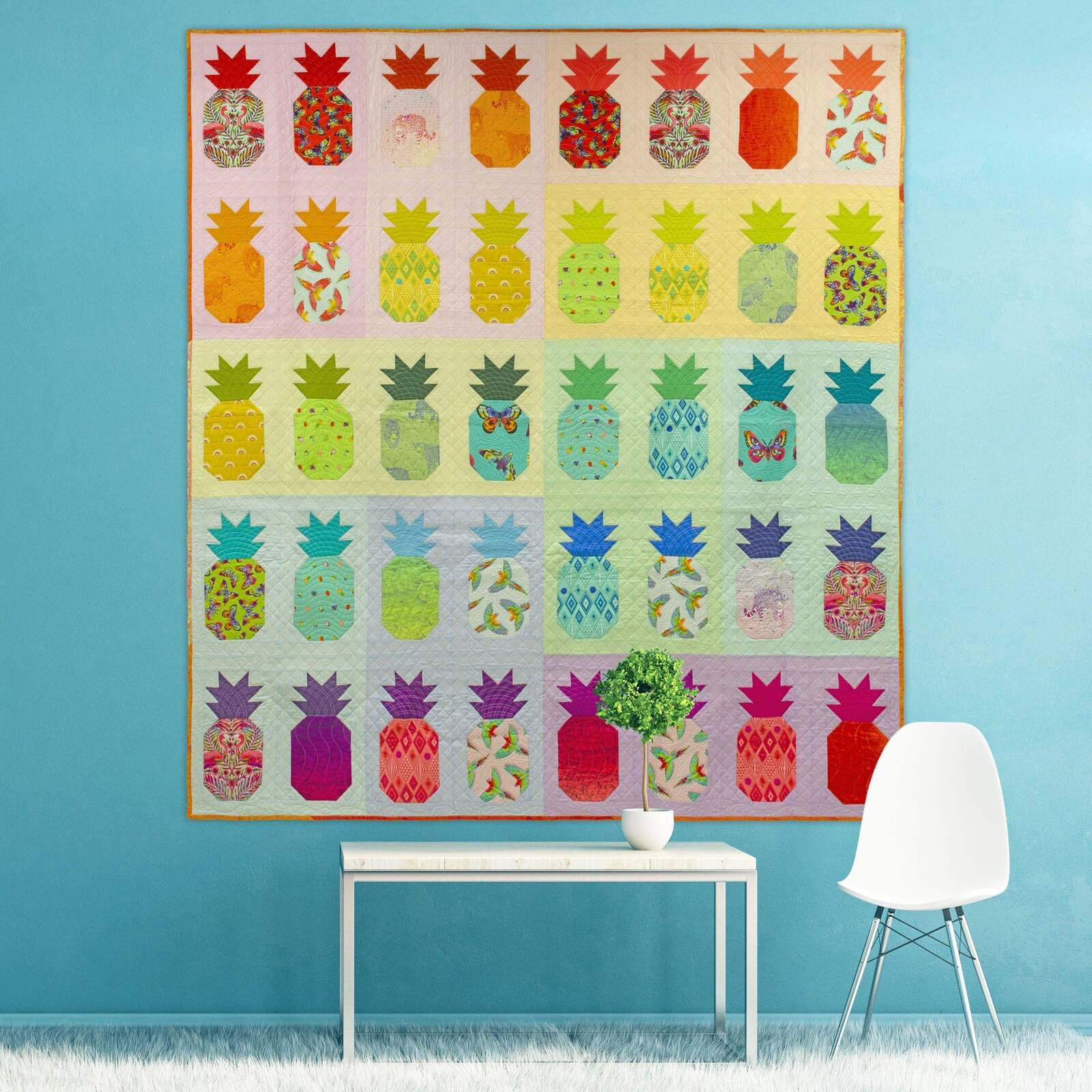 Pineapple quilt with rows of colorful pineapple blocks on cream background