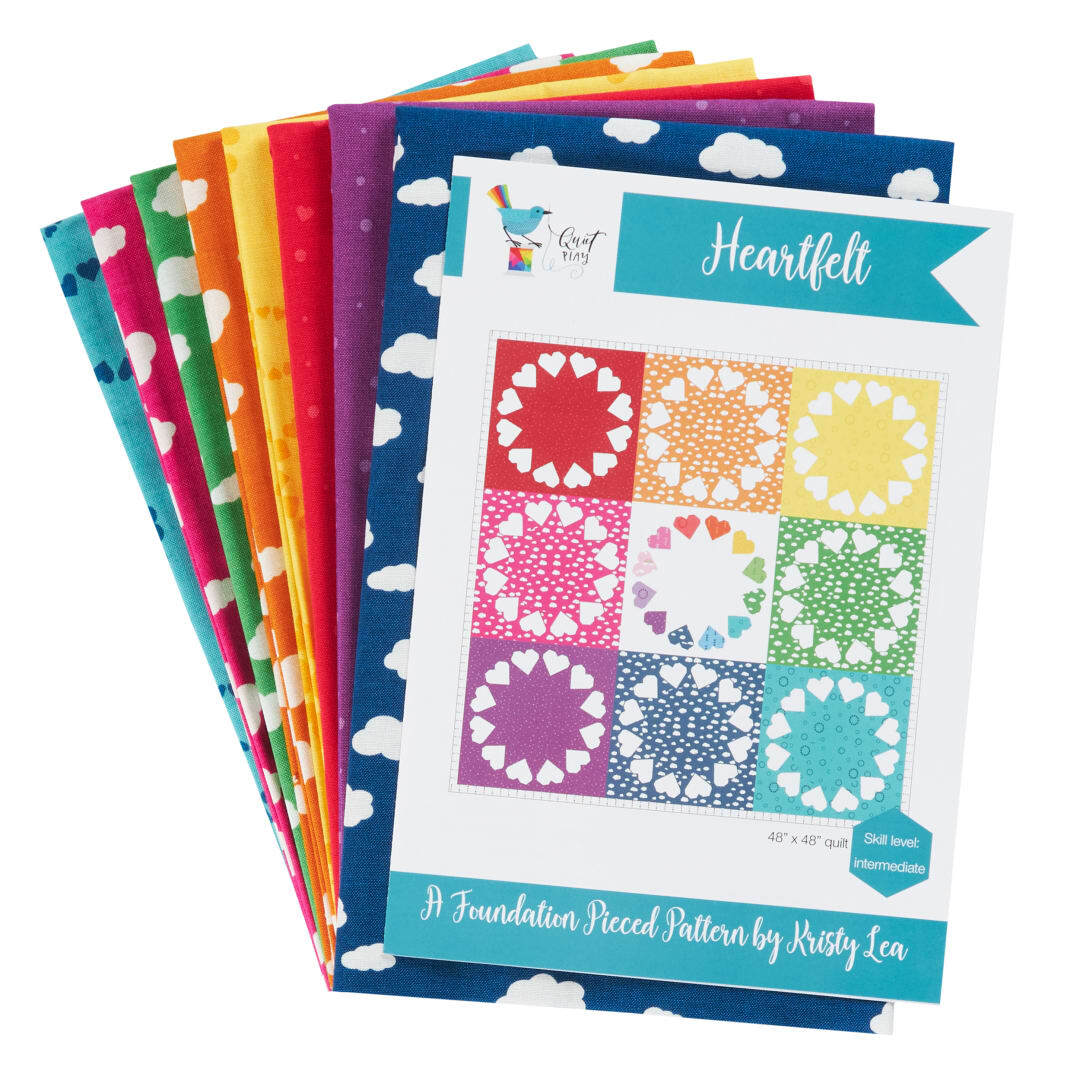 Heart patchwork quilt kit sheets with stacked multicolor fabrics