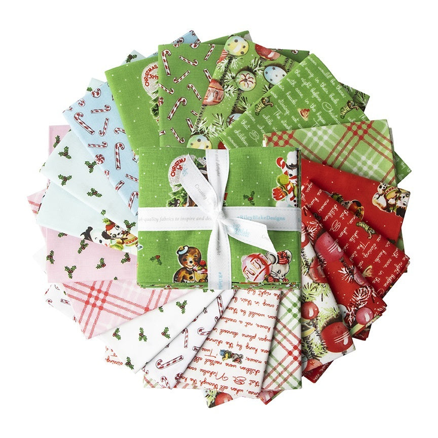 Christmas fabric fat quarter bundle showing assorted red, green, and white holiday prints