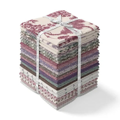Multicolor fabric fat quarter bundle with folded quarters tied with ribbon