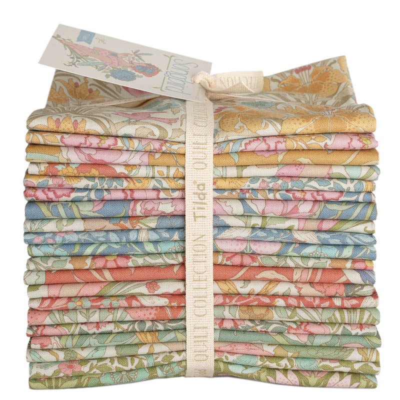 Quilt fabric fat quarter bundle with pastel bird and floral prints, neatly folded stack