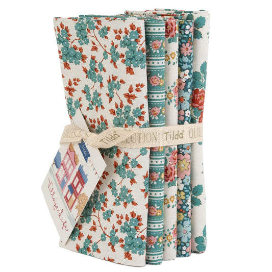 Set of five folded teal floral fat quarters with mixed orange, pink, and blue patterns