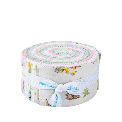 Quilt jelly roll fabric roll with pastel center spiral and woodland animal prints, ribbon tied