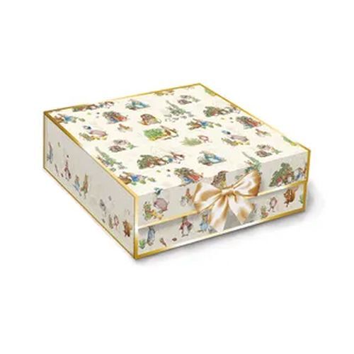 Boxed quilt kit with animal-print fabric top and gold ribbon bow