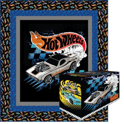 Quilt kit panel with Hot Wheels race cars in blue, black, and gray
