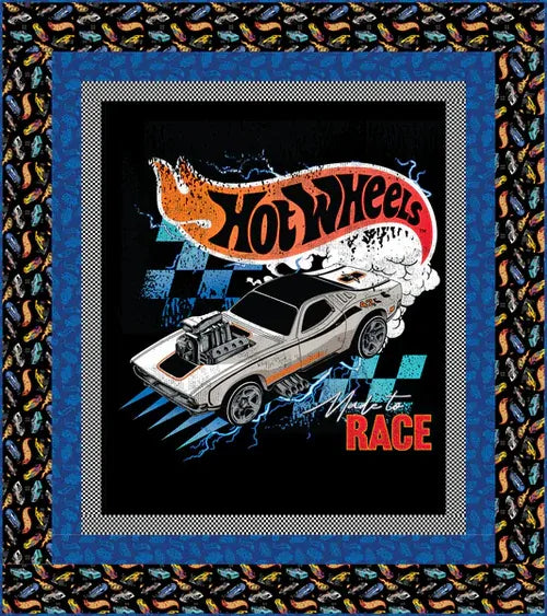 Hot Wheels racing car quilt block with black background, blue frame border, and checker accents