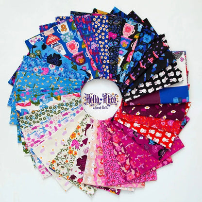 Assorted fabric fat quarters, colorful floral and character patterns in folded rectangles