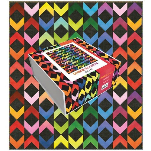 Quilt kit box with multicolor geometric patchwork fabric pieces