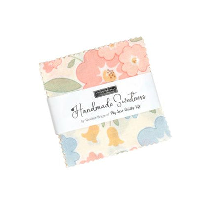Pastel floral mini charm pack in branded sleeve with 'Handmade Sweetness' label