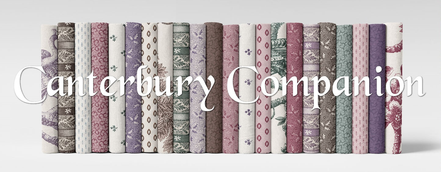 Assorted fabric fat quarter bundle with folded strips of geometric and floral prints