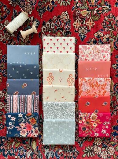Fat quarter stack bundle: red, blue, cream floral prints on mixed cotton fabrics