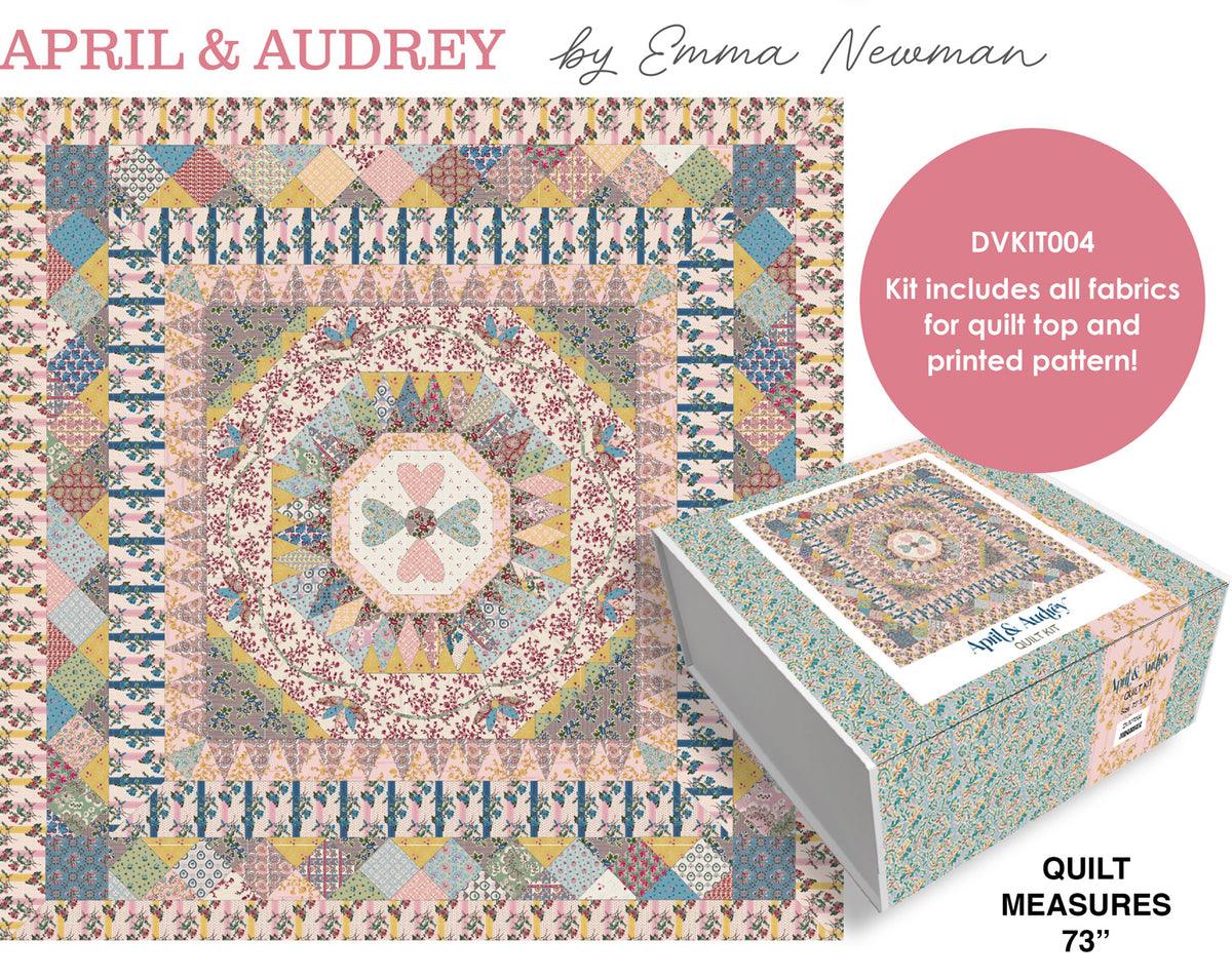 Quilt kit box with finished quilt design; includes fabric for top and printed pattern.