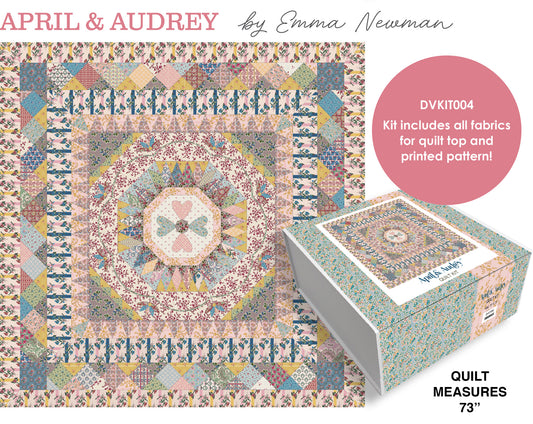 Quilt kit box with finished quilt design; includes fabric for top and printed pattern.