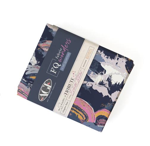 Fat quarter bundle wrapped in fabric sleeve with mountain and abstract pattern design