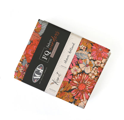 Fat quarter bundle with floral fabric assortment and printed label on wrapped stack