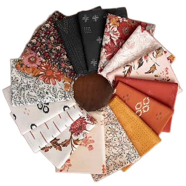 Round set of folded fat quarters with floral, paisley, and geometric motifs in assorted colors