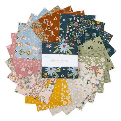 Collection of colorful fabric squares with a brand label in the center.