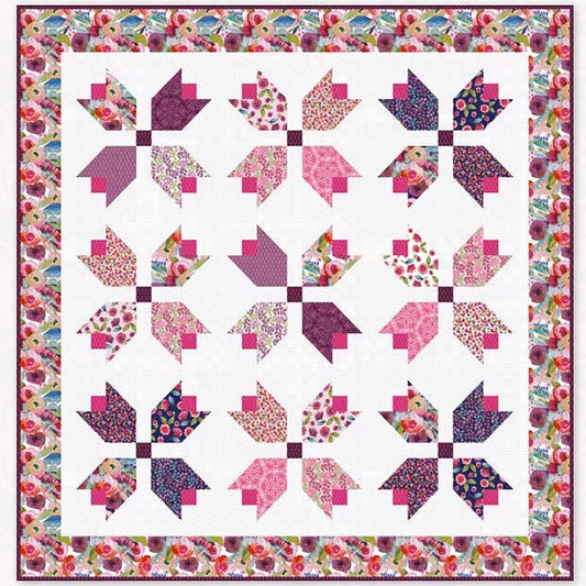 Floral pinwheel quilt block design with checker accents on white fabric, quilt pattern layout