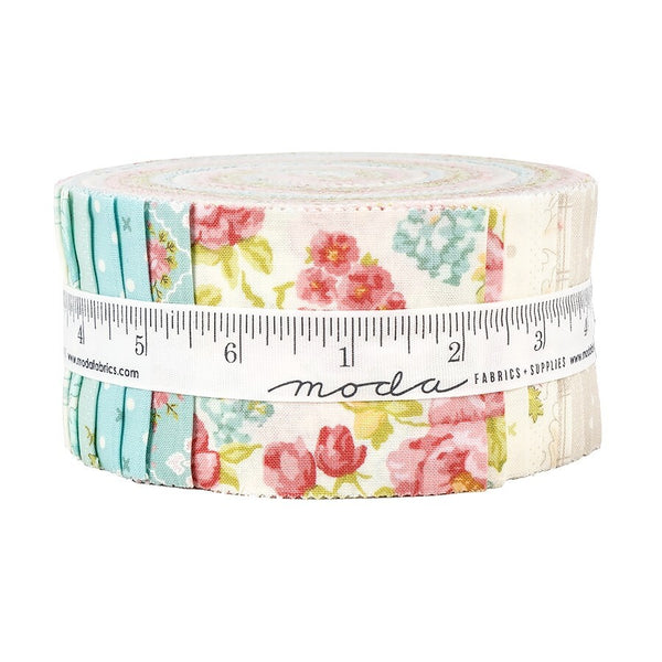 Pastel floral jelly roll fabric bundle with Moda label and ruler detail