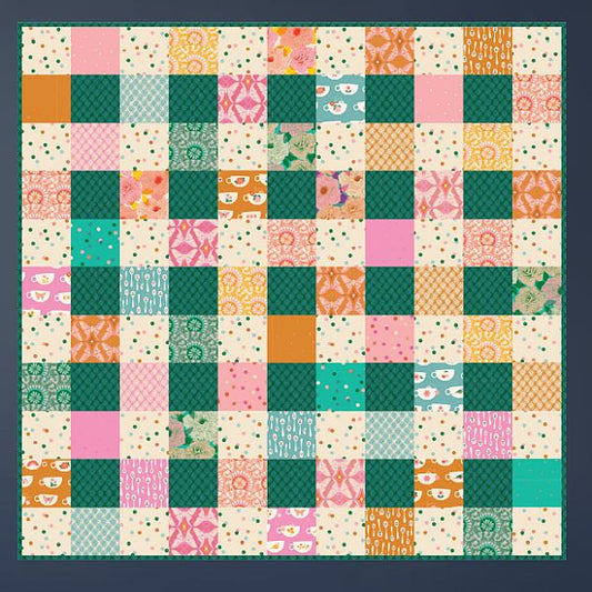 Quilt pattern with multicolor patchwork square blocks and mixed prints
