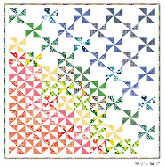Pinwheel quilt pattern fat quarter layout with colorful star blocks on white fabric