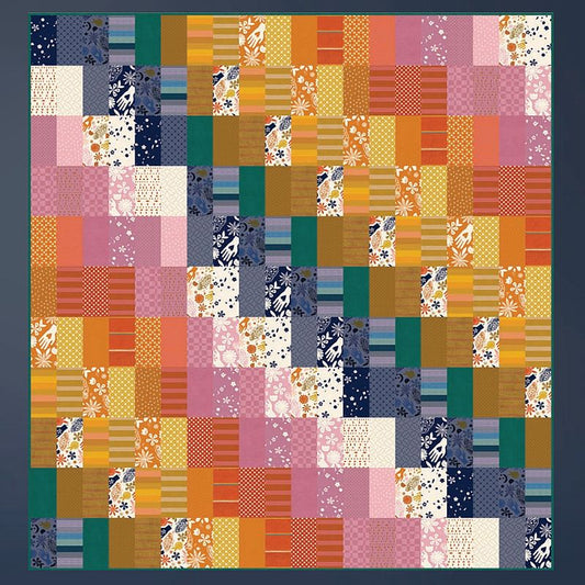 Patchwork quilt top design made of assorted multicolor fabric squares