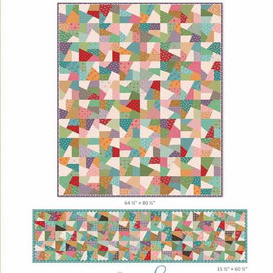Colorful patchwork quilt with geometric blocks made from multicolor fabric pieces