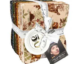 Bundle of pre-cut fabric fat quarters with autumn leaf and animal prints
