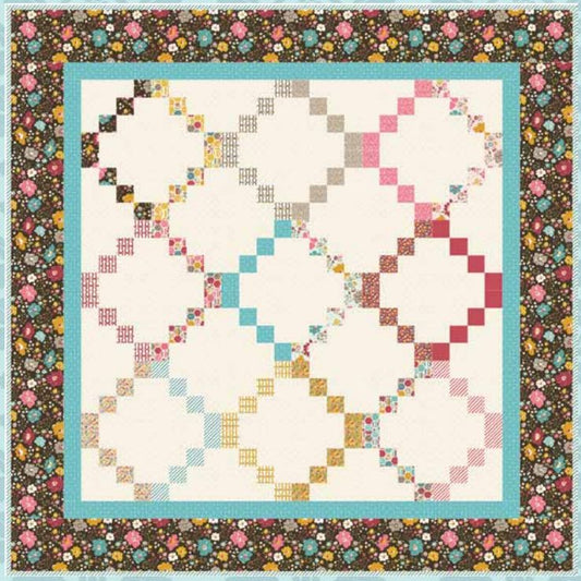 Jelly roll friendly quilt pattern PDF with multicolor star patchwork layout on white