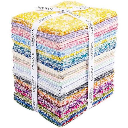 A gorgeous pack of 40 fat quarters with pretty florals in a rainbow of colours with a bundle and ribbon with Liberty Fabrics