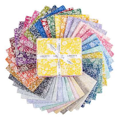 A gorgeous pack of 40 fat quarters with pretty florals in a rainbow of colours with a bundle and ribbon with Liberty Fabrics