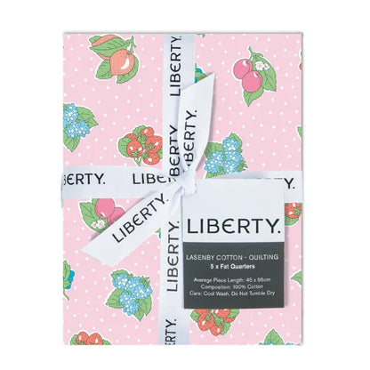 Garden-themed cotton fat quarter bundle with pink floral and fruit prints, Liberty branding