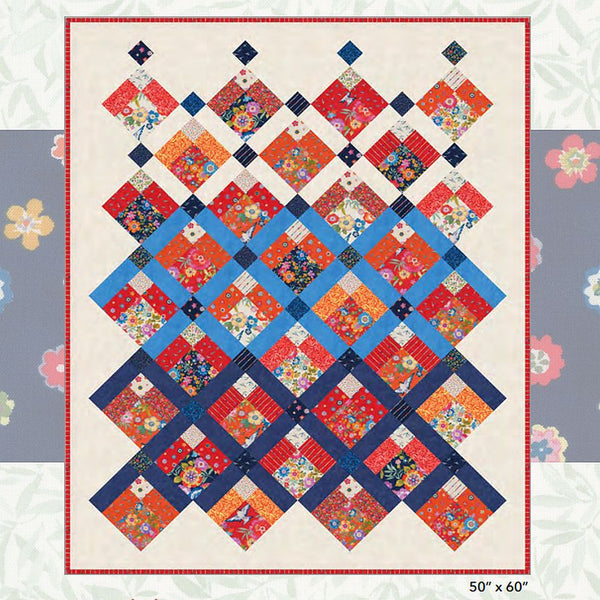 Patchwork quilt block design with red, blue, and cream squares, 50 x 60 in