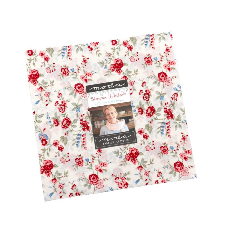 Packaged 10-inch layer cake fabric bundle, cream with red roses and blue flowers