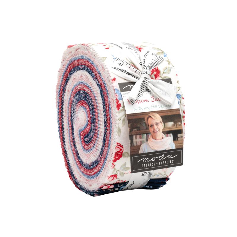 Quilt fabric jelly roll with multicolor swirl prints in blue, red, and cream