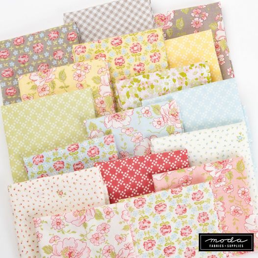 Floral layer cake fabric squares in pastel pink, yellow, blue, and green