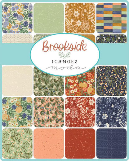 Charm pack display of floral and leaf quilting squares, mixed blues, greens, and rust tones