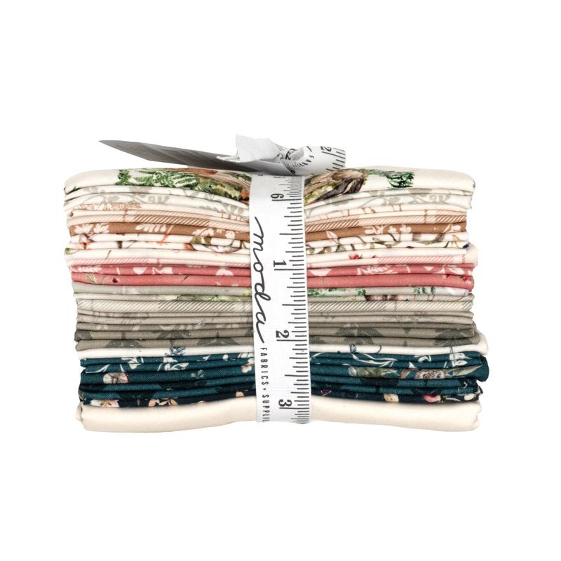 Collection of fabric swatches with nature-themed designs and a ruler ribbon, featuring the Moda brand.