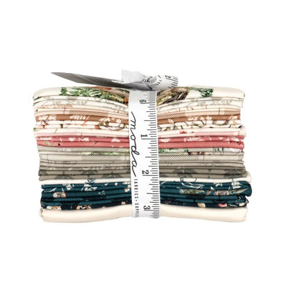 Collection of fabric swatches with nature-themed designs and a ruler ribbon, featuring the Moda brand.