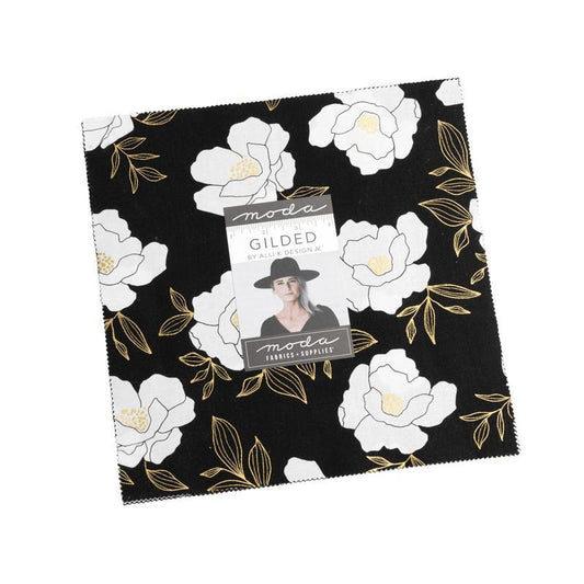 Gilded Floral layer cake by Moda Fabrics with coordinated 10 inch quilting fabric squares