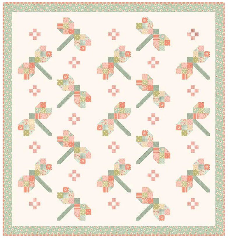 Cream quilt fabric with repeating sunbonnet blocks, patch motifs, and teal border