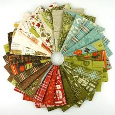 10-inch layer cake fabric bundle with assorted woodland print squares, green and red